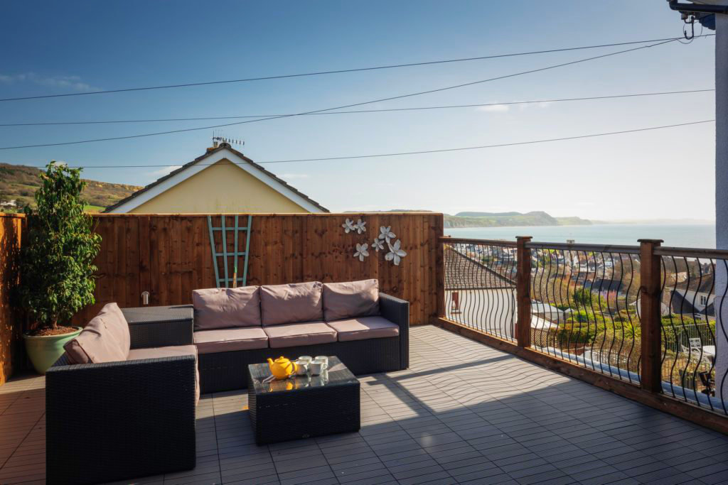 Jurassic Coast views from holiday cottage terrace in Lyme Regis by Jurassic Properties