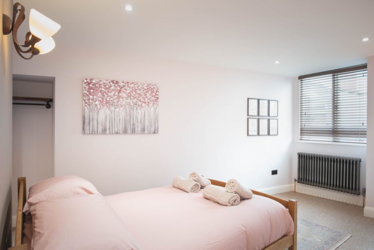 Self catered holiday cottage bedroom by Jurassic Properties in Lyme Regis