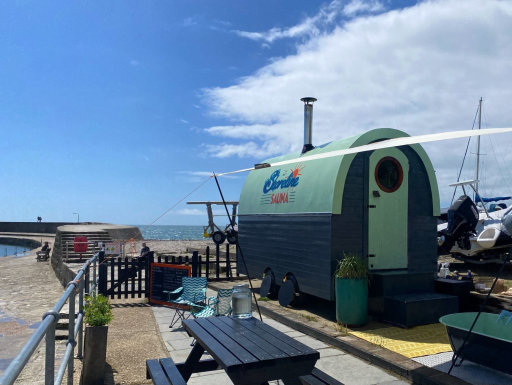 sauna on the beach with views of the cobb lyme regis