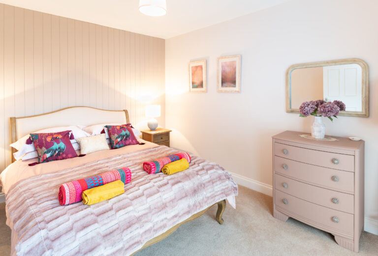 holiday cottage bedroom with sea views
