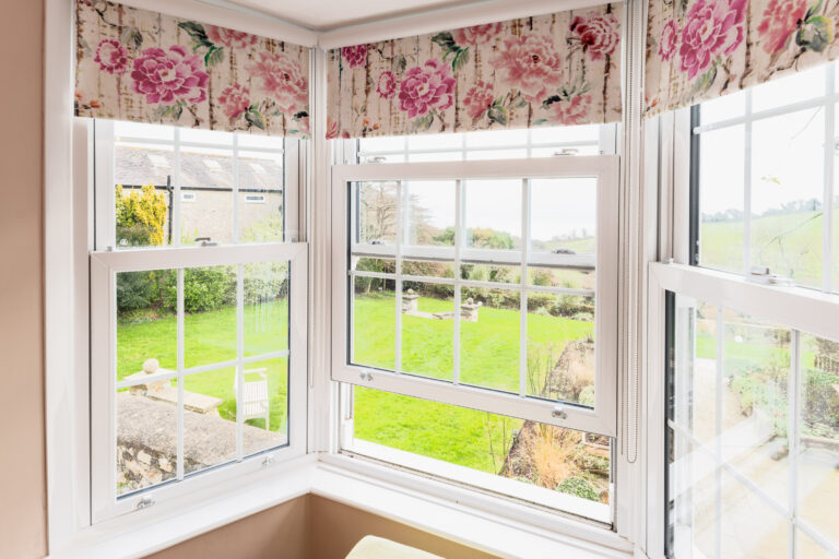 holiday cottage bedroom with sea views